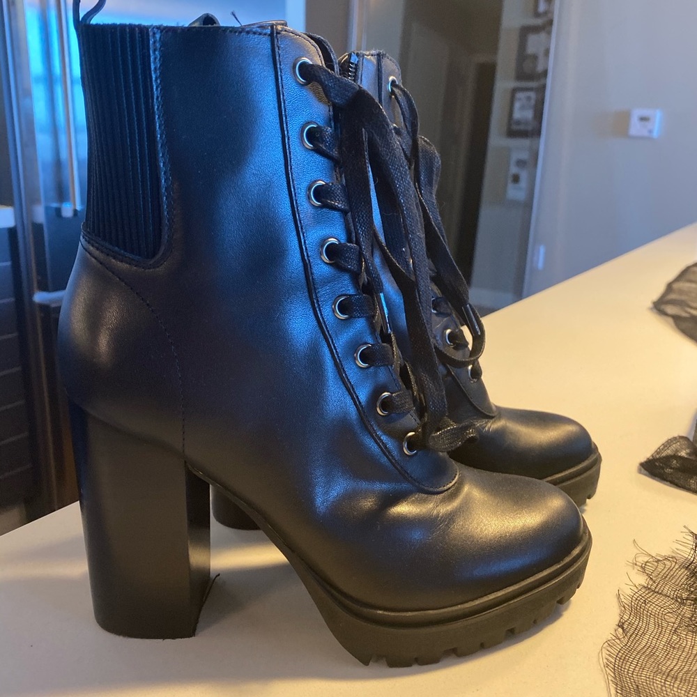 Steve Madden latch black leather booties size 6